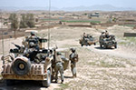 Afghan Forces Battle to Win Back District Center